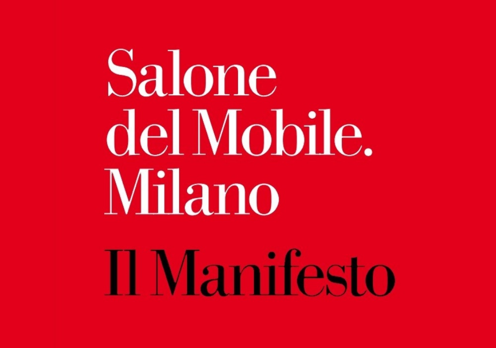 Salone del Mobile Milano Il Manifesto, testo bianco e nero su sfondo rosso.